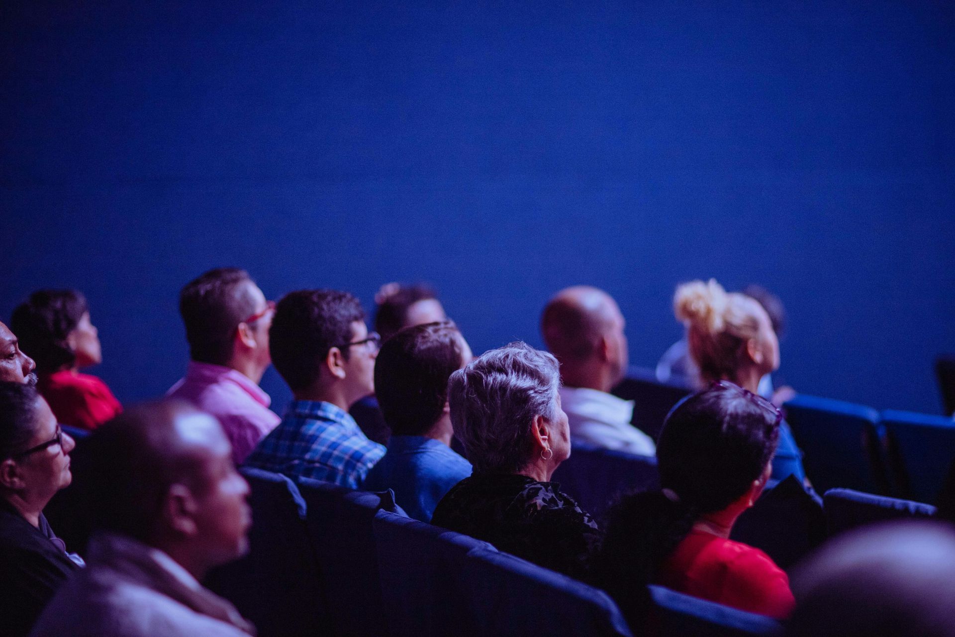 Audience seated at a public speaking mental health workshop